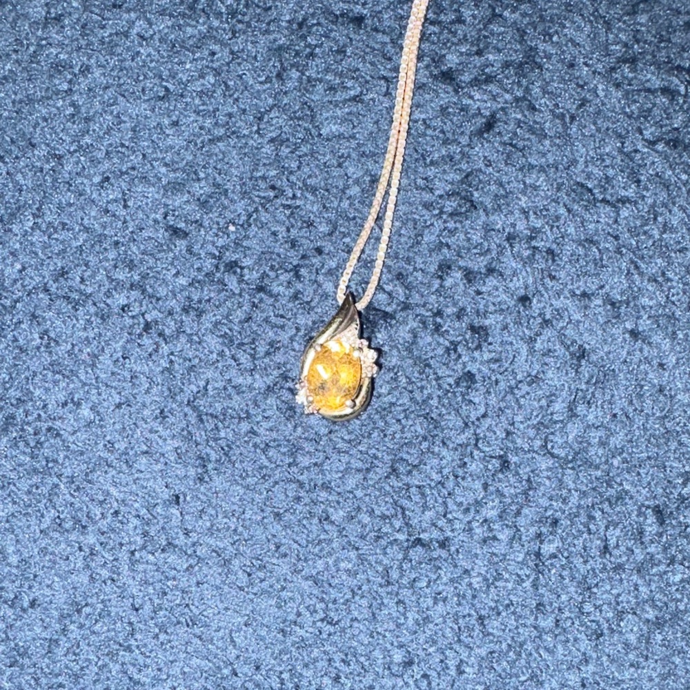 Elegant Gold and Silver Teardrop Pendant Necklace